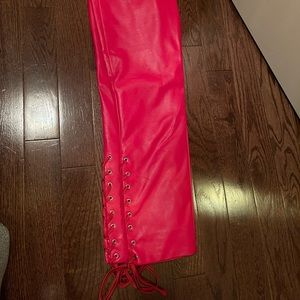 Hot red lace up leather pants. Lovers and Friends in cherry red